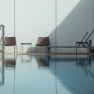 Aussenpool, © Friedl&Partner, Klinglhuber GmbH Moderner Außenpool mit zwei Stühlen und einer Liege an einer weißen Wand.